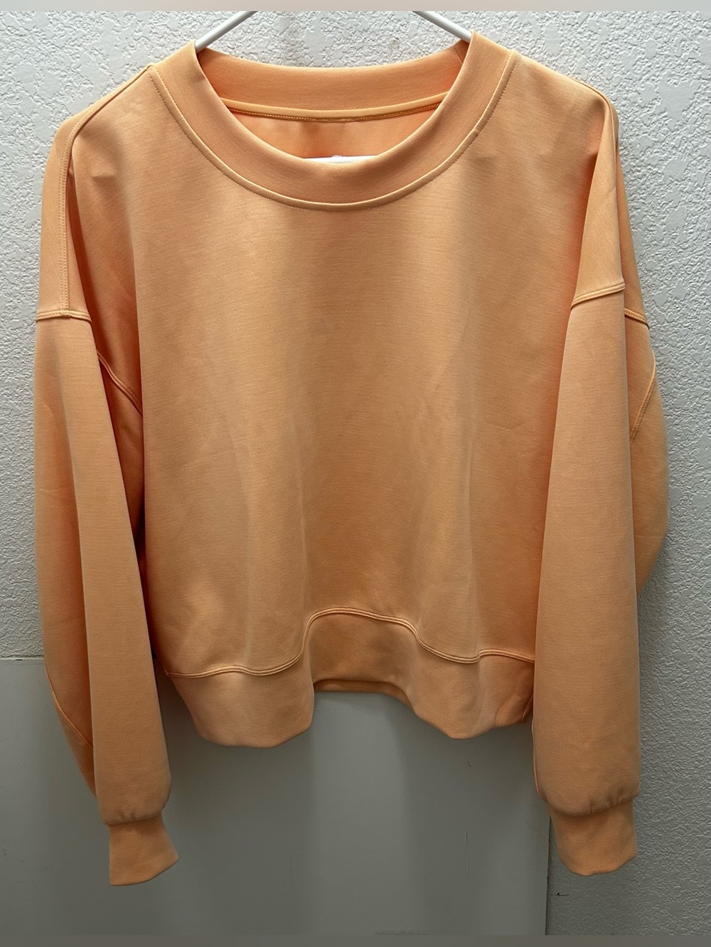 Lululemon Athletica Scuba crewneck sweatshirt, light orange, women’s size 6. EUC